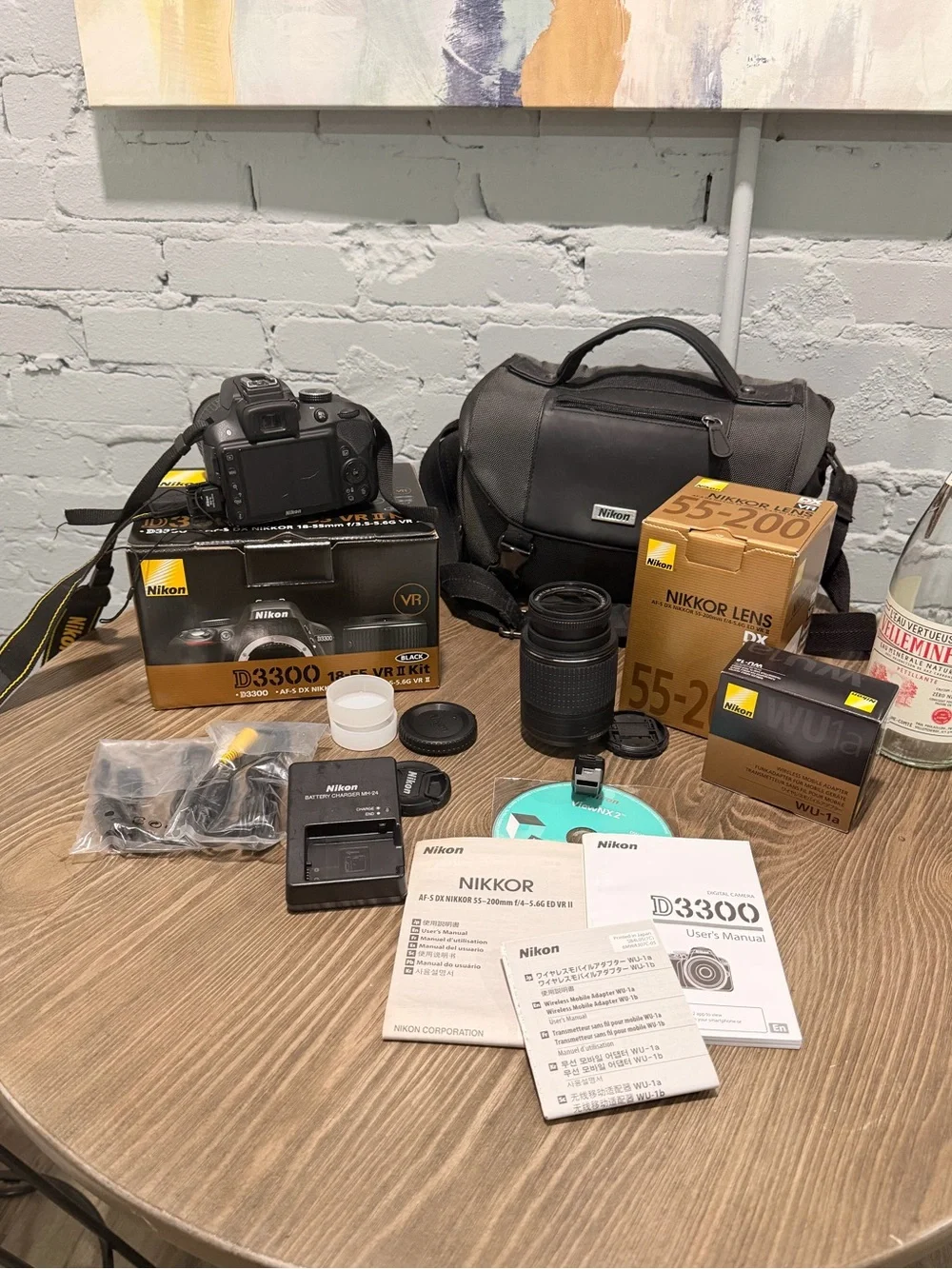 Nikon D3300 DSLR Bundle — 18-55mm + 55-200mm VR, WU-1a, Bag, Boxes — 4,627 Shots